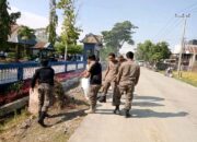 Satpol PP Sidrap Gelar Kerja Bakti di Depan SMPN 4 Maritengngae Peringati World Cleanup Day 2025